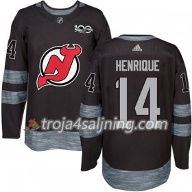 New Jersey Devils tröja Adam Henrique 14 1917-2017 100th Anniversary Adidas Svart Authentic - NHL Tröjor Herr